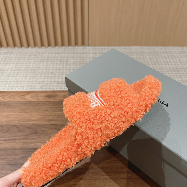 FURRY SLIDES IN ORANGE CURLY SHEARLING