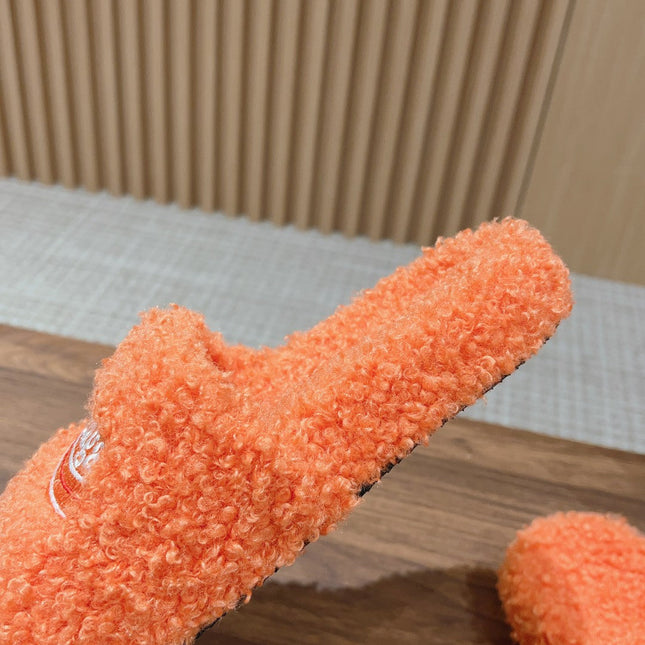 FURRY SLIDES IN ORANGE CURLY SHEARLING