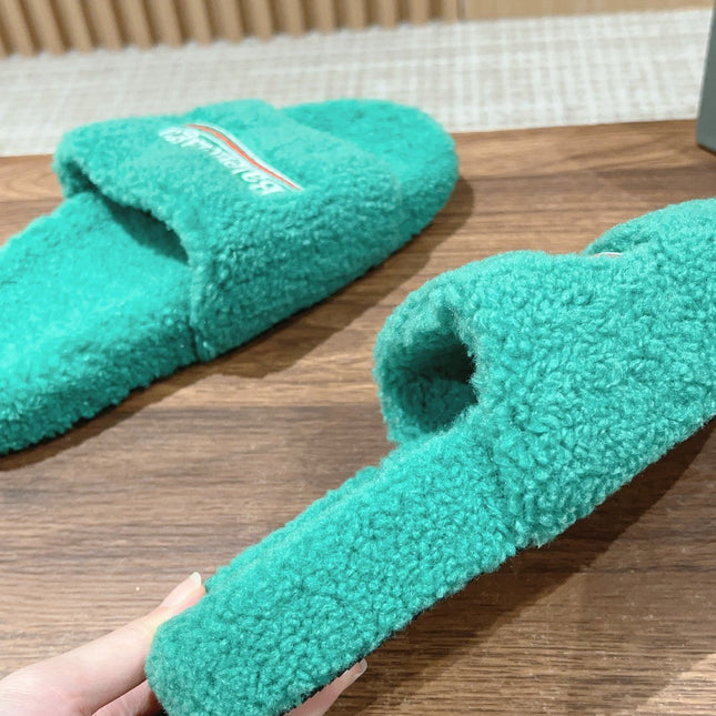 FURRY SLIDES IN TURQUOISE CURLY SHEARLING