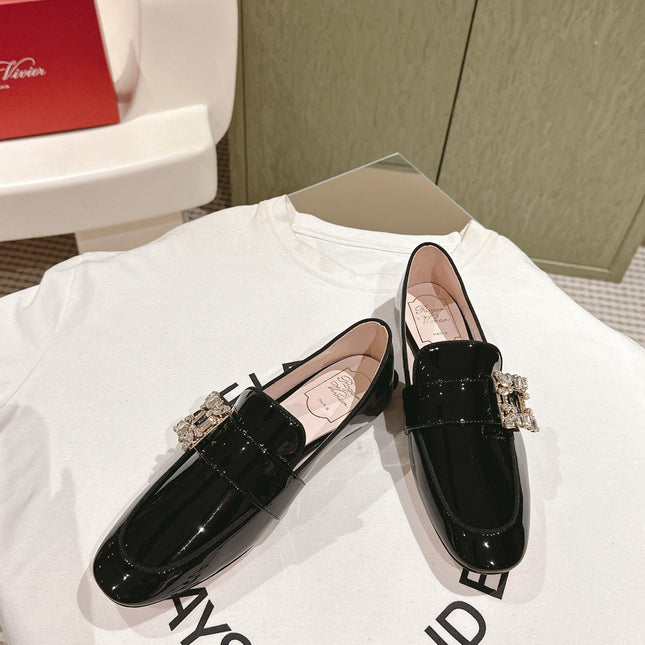 MINI BROCHE VIVIER BUCKLE LOAFERS IN BLACK PATENT CALFSKIN