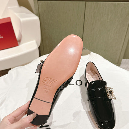 MINI BROCHE VIVIER BUCKLE LOAFERS IN BLACK PATENT CALFSKIN