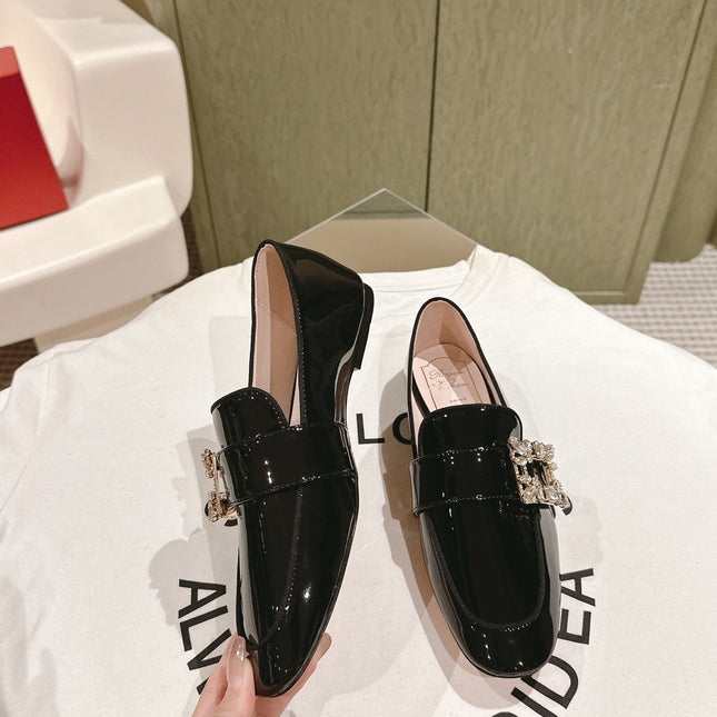 MINI BROCHE VIVIER BUCKLE LOAFERS IN BLACK PATENT CALFSKIN