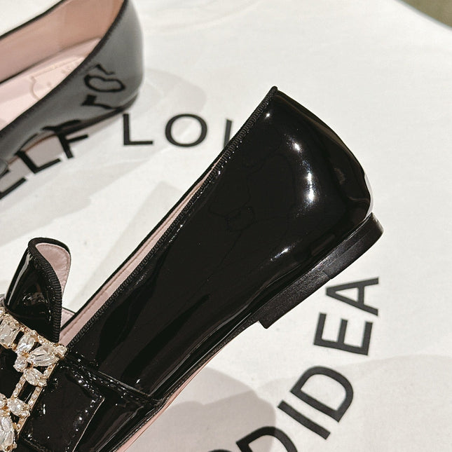 MINI BROCHE VIVIER BUCKLE LOAFERS IN BLACK PATENT CALFSKIN