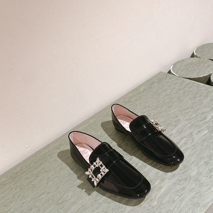 MINI BROCHE VIVIER BUCKLE LOAFERS IN BLACK PATENT CALFSKIN