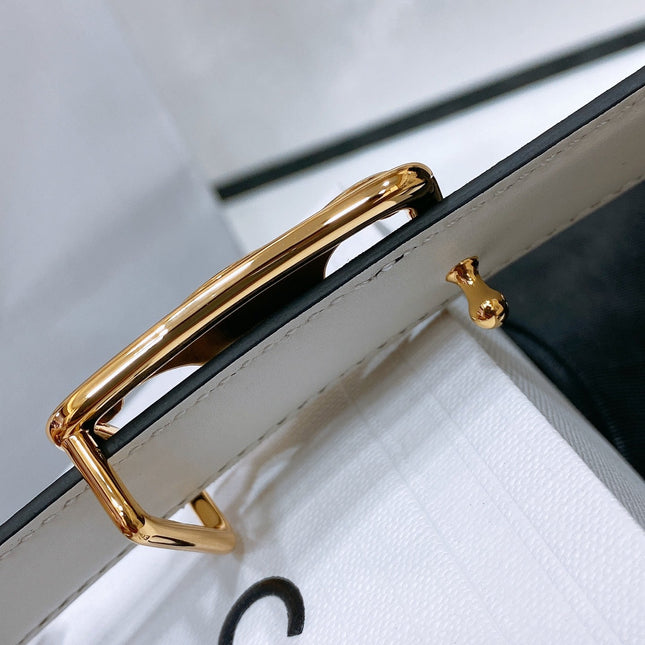 CL MEDIUM 25 MM TRIOMPHE BELT IN TAURILLON AND BLACK CALFSKIN GOLD HARDWARE