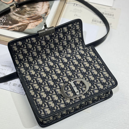 MONTAIGNE EAST-WEST BAG 24 IN BLACK LAMBSKIN AND MONOGRAM OBLIQUE JACQUARD