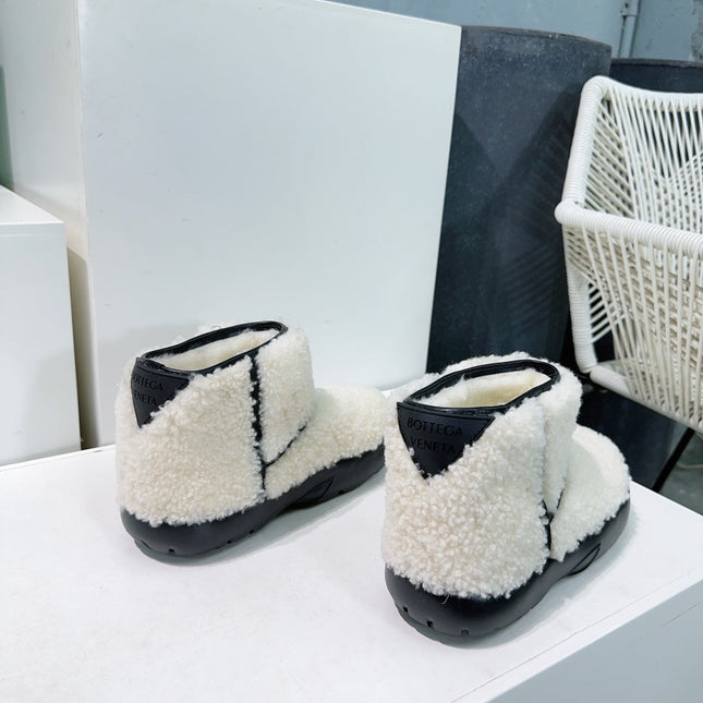 MINI ANKLE BOOT IN WHITE SHEARLING WITH BLACK ULTRA LIGHTWEIGHT RUBBER OUTSOLE
