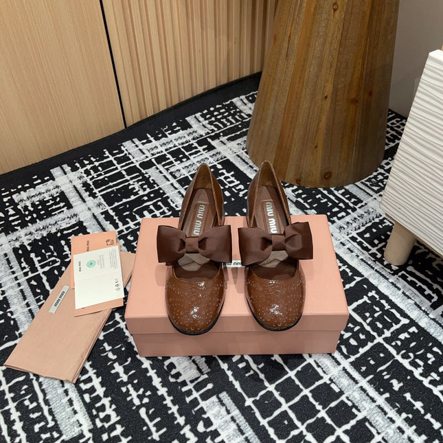 MARY JANE MID HEEL PUMPS IN RUSSET BROWN PATENT LAMBSKIN WITH BOW
