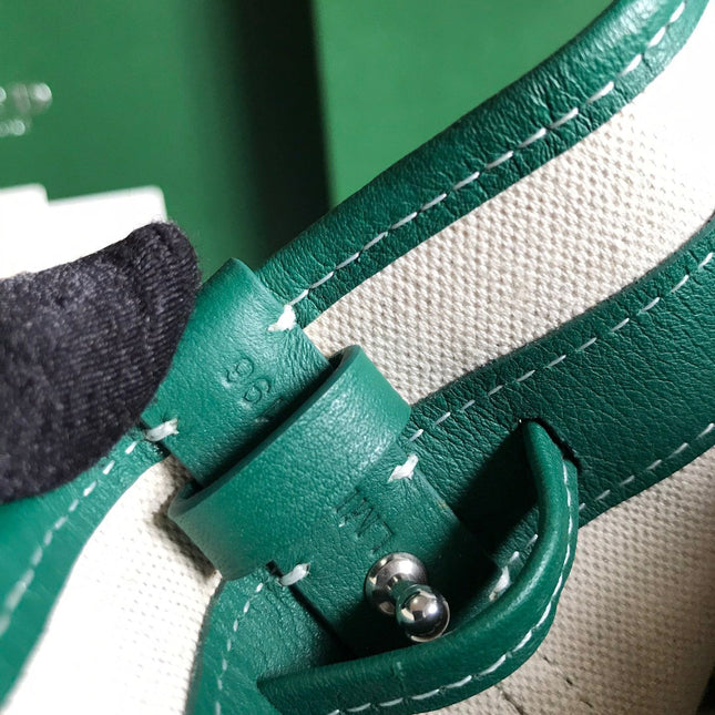 PETIT FLOT BUCKET BAG 22 IN GREEN GOYARDINE CANVAS AND LAMBSKIN TRIM