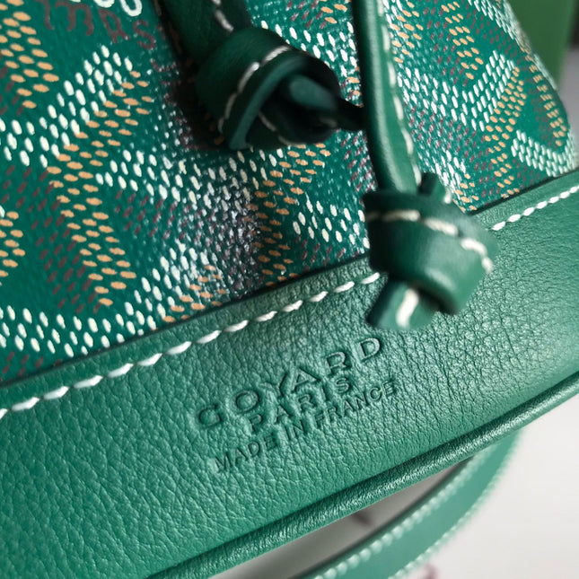 PETIT FLOT BUCKET BAG 22 IN GREEN GOYARDINE CANVAS AND LAMBSKIN TRIM