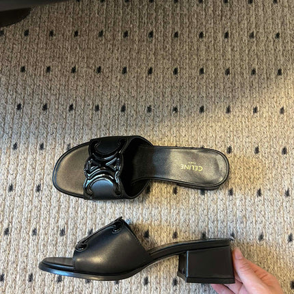 CLEMENCE MULE IN BLACK LAMBSKIN AND PATENT CALFSKIN