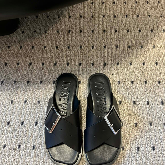 PETAL BELT FLAT SANDAL IN BLACK CALFSKIN