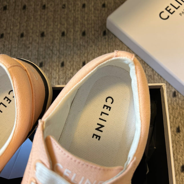 TRAINER LOW LACE-UP SNEAKER IN LIGHT ORANGE CANVAS