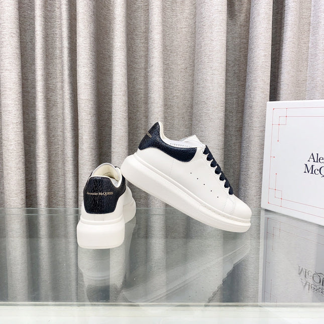 OVERSIZED SNEAKERS IN WHITE CALFSKIN WITH BLACK HEEL TAB