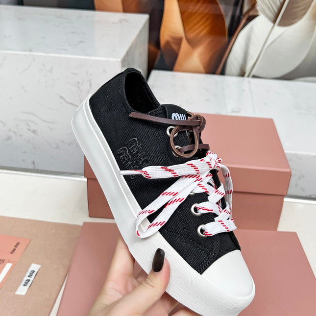 WASHED-DENIM SNEAKERS IN BLACK CANVAS WITH BROWN AND STRIPED LACES