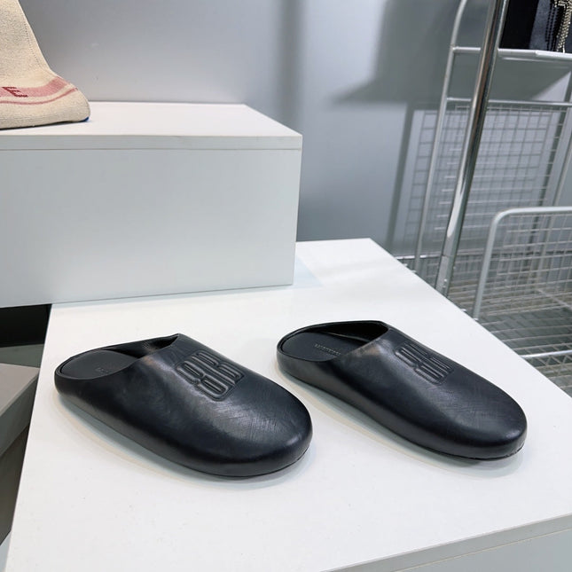 BALENCIAGA 25S MULES IN BLACK LAMBSKIN