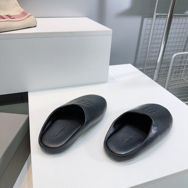 BALENCIAGA 25S MULES IN BLACK LAMBSKIN