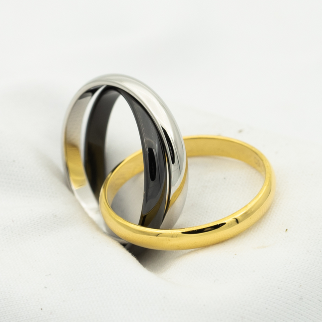 TRINITY RING BLACK GOLD SILVER