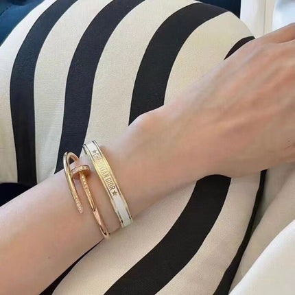 CODE BANGLE GOLD WHITE METAL AND LACQUER BRACELET