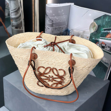 MEDIUM ANAGRAM BASKET BAG 46 IN BEIGE IRACA PALM AND TAN CALFSKIN