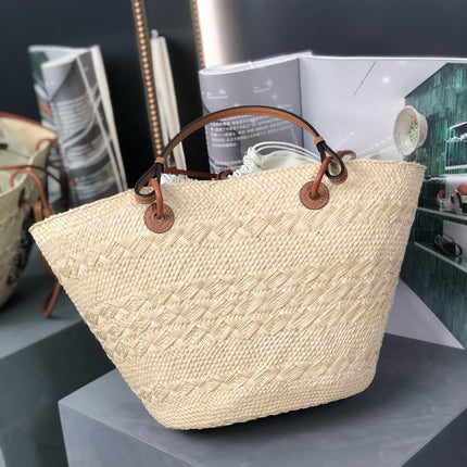 MEDIUM ANAGRAM BASKET BAG 46 IN BEIGE IRACA PALM AND TAN CALFSKIN