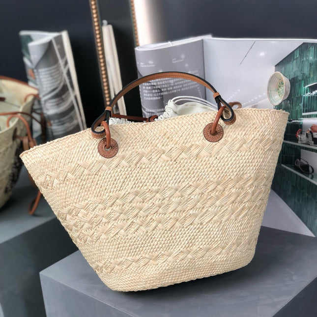 MEDIUM ANAGRAM BASKET BAG 46 IN BEIGE IRACA PALM AND TAN CALFSKIN