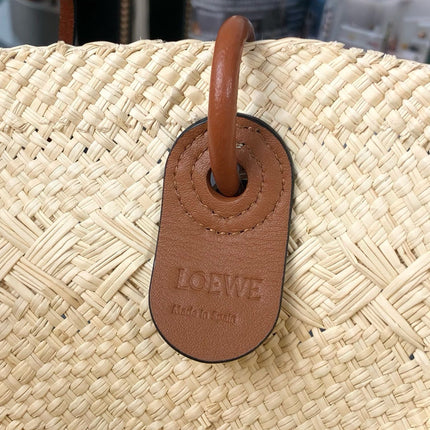 MEDIUM ANAGRAM BASKET BAG 46 IN BEIGE IRACA PALM AND TAN CALFSKIN