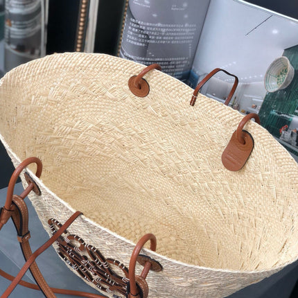 MEDIUM ANAGRAM BASKET BAG 46 IN BEIGE IRACA PALM AND TAN CALFSKIN