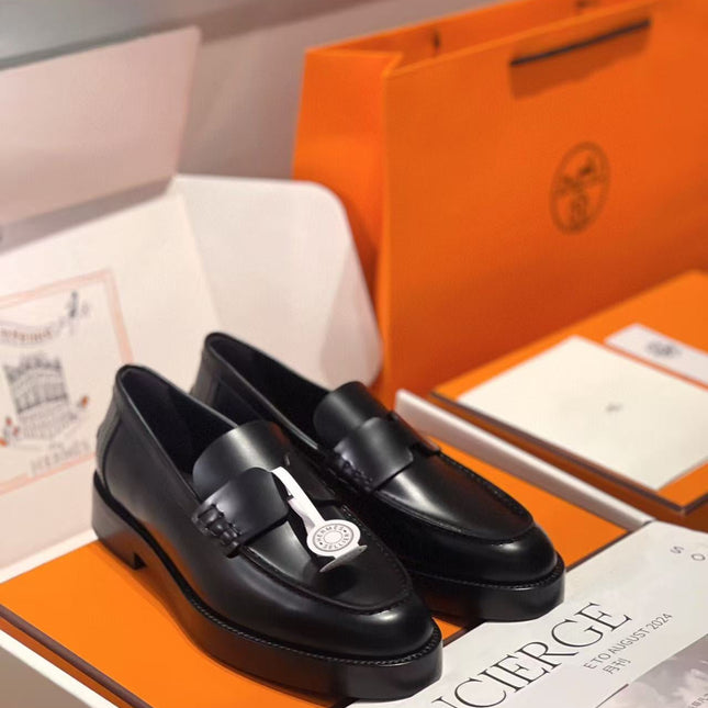 HM PARIS LOAFERS IN BLACK CALFSKIN WITH CLASSIC PENNY STRAP DESIGN