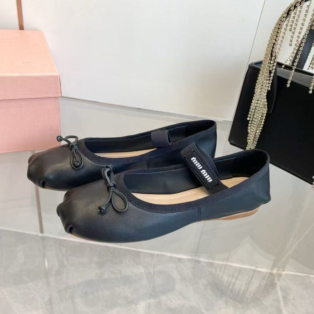 MM BOW BALLET FLATS IN BLACK CALFSKIN