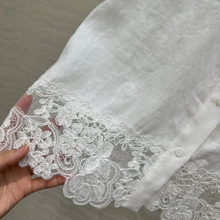 SLEEVELESS BLOUSE IN WHITE LINEN LACE TRIM AND NECK TIE