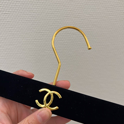 Chanel hanger's in black velvet and gold hardware