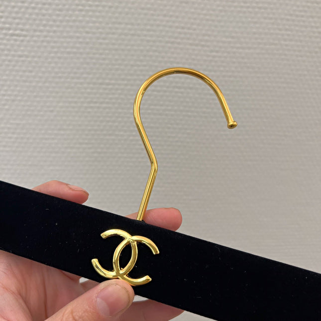 Chanel hanger's in black velvet and gold hardware