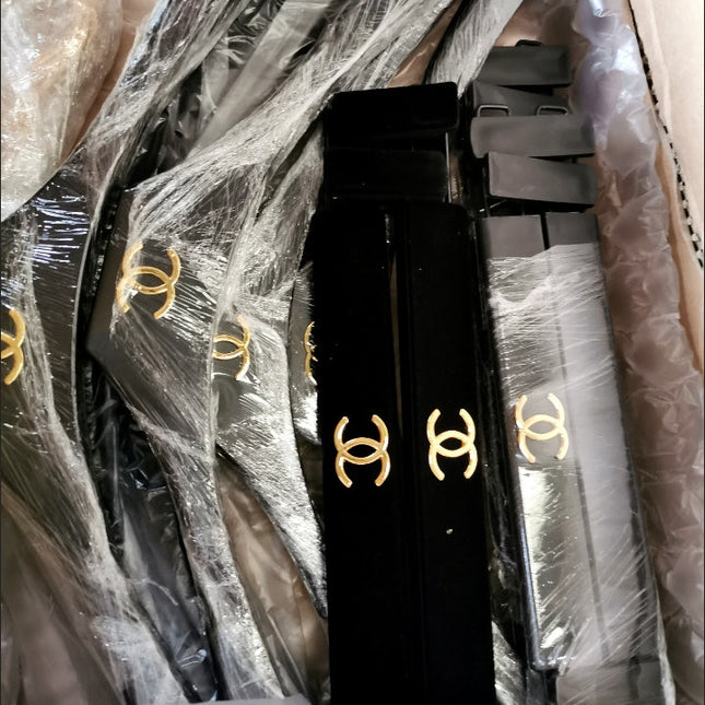 Chanel hanger's in black velvet and gold hardware