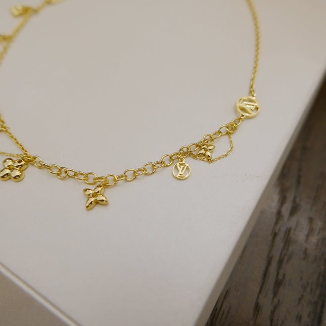 BLOOMING SUPPLE NECKLACE BRASS