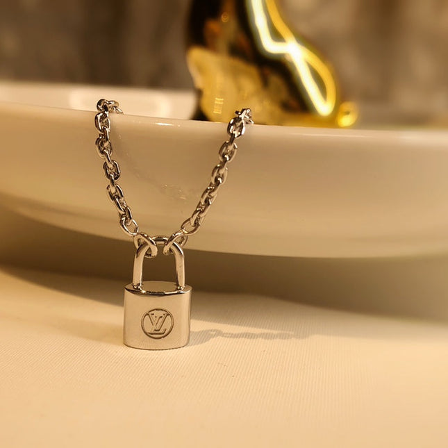 LV CHARITY LOCK NECKLACE