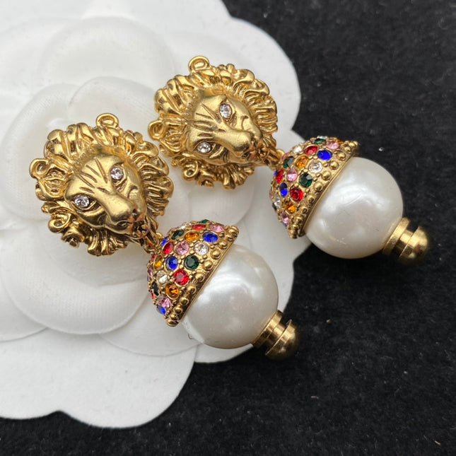 GG LION HEAD PEARL COLORED DIAMOND EARRINGS