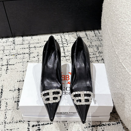 POINTED HIGH PUMPS IN BLACK PATENT CALFSKIN WITH CRYSTAL BUCKLE