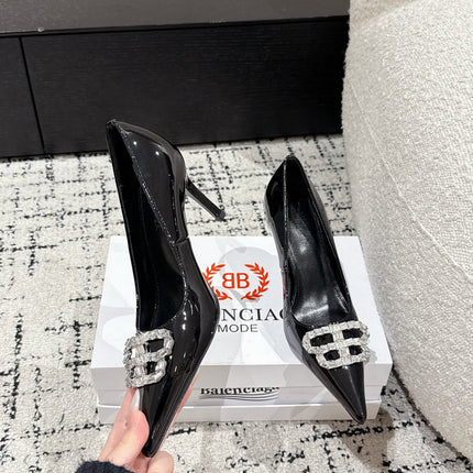 POINTED HIGH PUMPS IN BLACK PATENT CALFSKIN WITH CRYSTAL BUCKLE