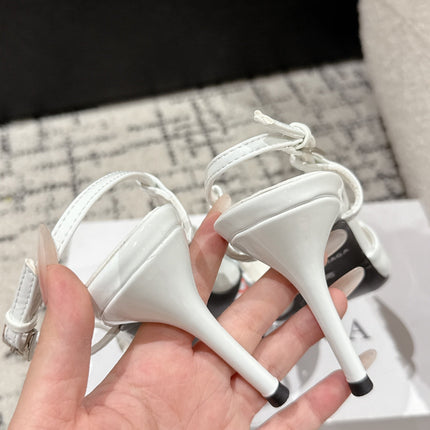 POINTED HIGH SLINGBACK IN WHITE PATENT CALFSKIN WITH CRYSTAL BUCKLE