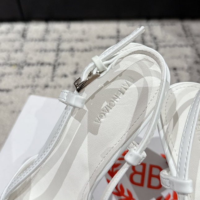 POINTED HIGH SLINGBACK IN WHITE PATENT CALFSKIN WITH CRYSTAL BUCKLE