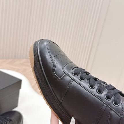 PRADA 25S DOWNTOWN SNEAKERS IN BLACK CALFSKIN