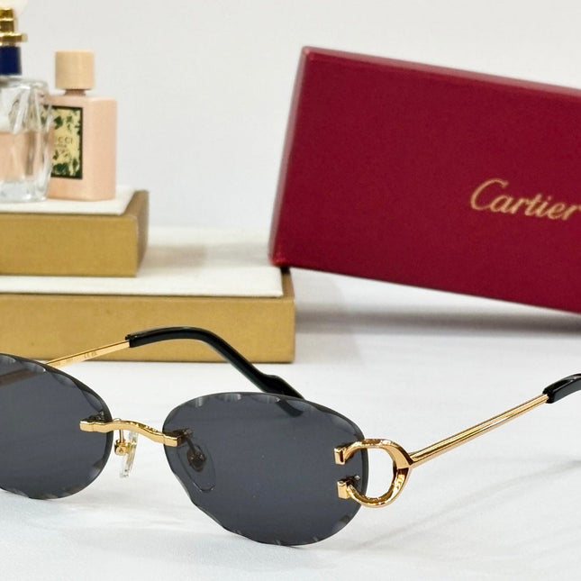 C DE RIMLESS ROUND FRAME SUNGLASSES CT0599S IN METAL