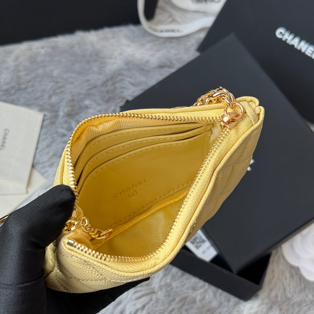 CC CLASSIC ZIPPED POUCH 14 IN YELLOW GRAINED CALFSKIN GOLD-TONE CHARM CHAIN