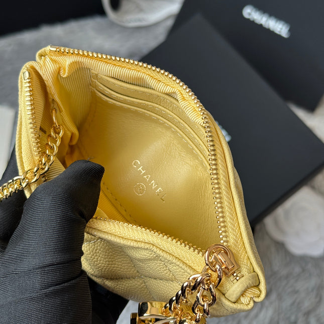 CC CLASSIC ZIPPED POUCH 14 IN YELLOW GRAINED CALFSKIN GOLD-TONE CHARM CHAIN