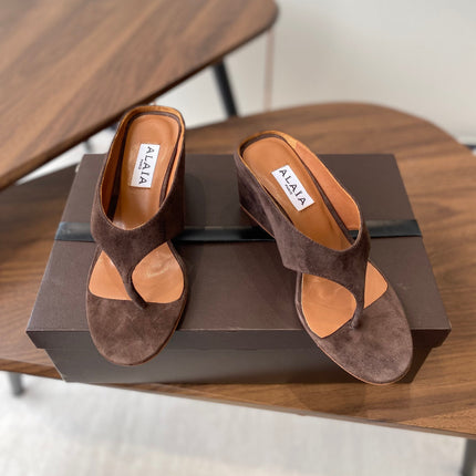 ALAIA WEDGE THONG SANDALS 25S IN BROWN SUEDE