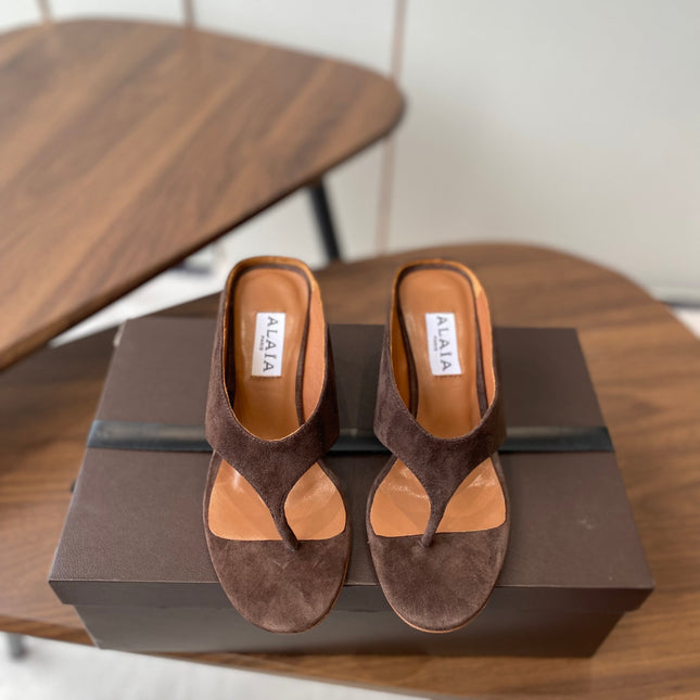 ALAIA WEDGE THONG SANDALS 25S IN BROWN SUEDE