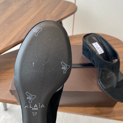 ALAIA WEDGE THONG SANDALS 25S IN BLACK SUEDE