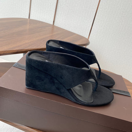 ALAIA WEDGE THONG SANDALS 25S IN BLACK SUEDE