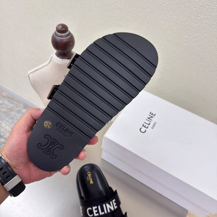 CELINE 25S FLAT SANDALS ARC DE TRIOMPHE IN BLACK CALFSKIN AND CANVAS